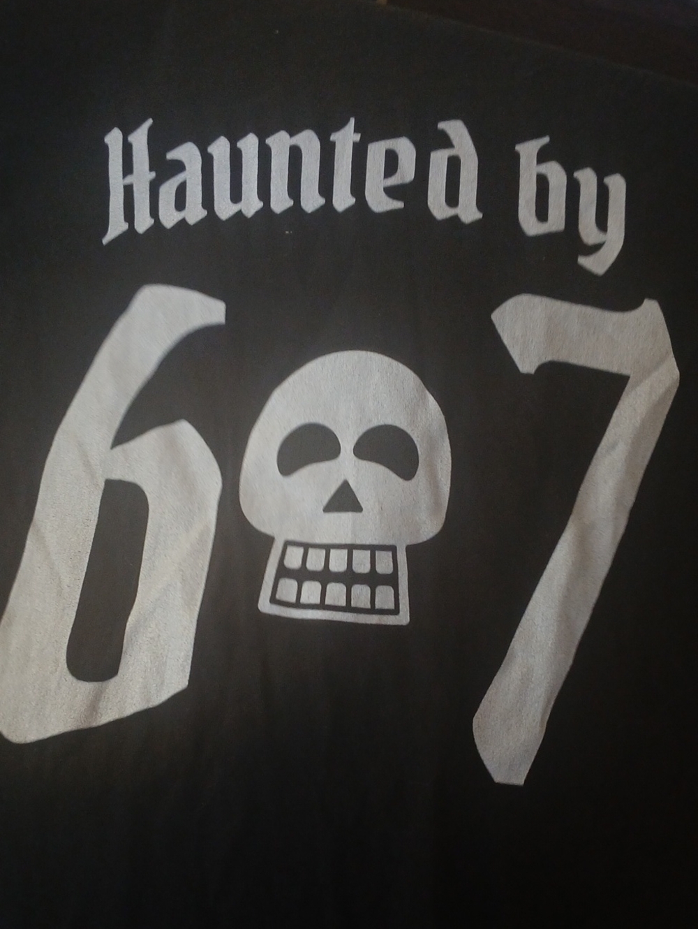 Graphic Skull 'Haunted by 67' Tee - Black & White